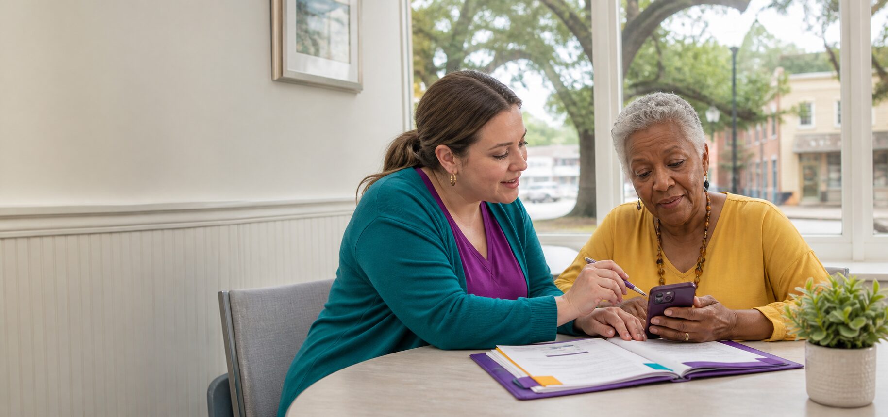 Hometown Resource Hub A Hometown Outreach volunteer helps an older neighbor find local resources.